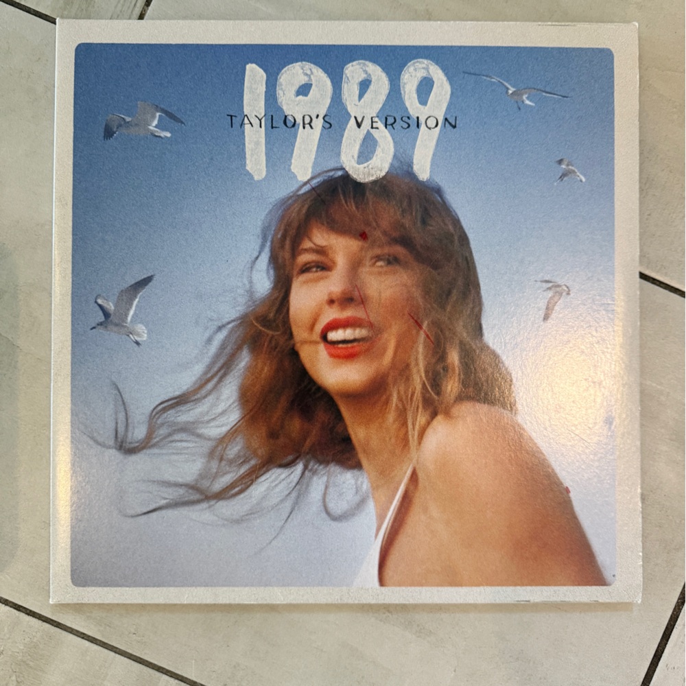 Taylor Swift 1989 Album with Blue and White Cover